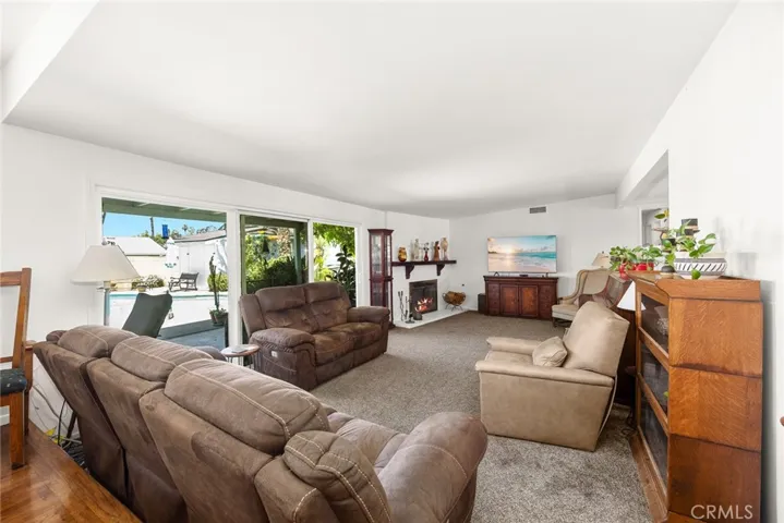 living/dining areas open to rear patio