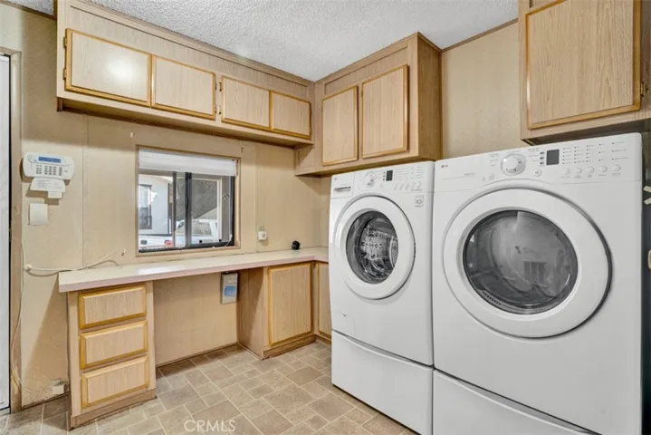 Washer & Dryer Included in separate room