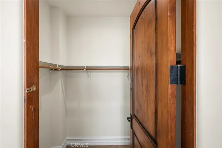 Walk in closet in primary bathroom