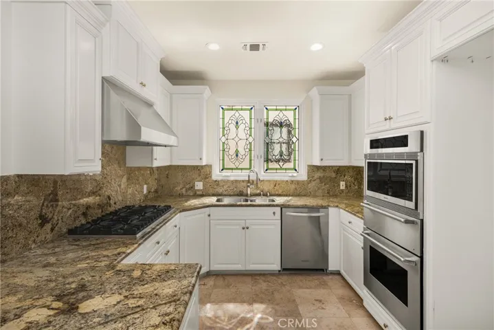 Kitchen filled with natural light and ocean breezes.