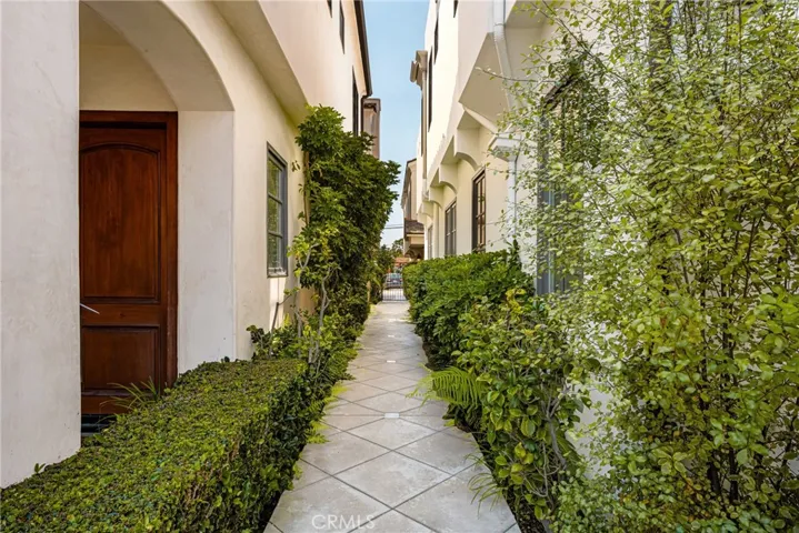 This charming back-unit coastal residence offers the perfect blend of privacy, comfort, and an unbeatable beachside location