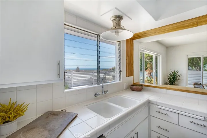 Kitchen dual sink and ocean view from kitchen window!
