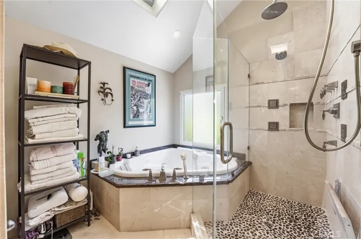 Primary bath with jetted tub and multi head shower