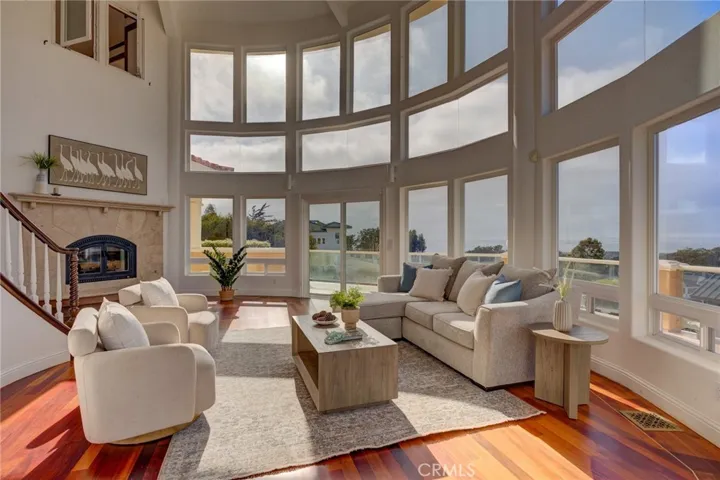 formal sitting area with gas fireplace