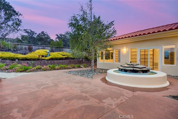 back yard  to landscaped area  and fountain