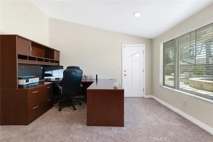 Primary Suite Retreat Area With Access To Back Patio