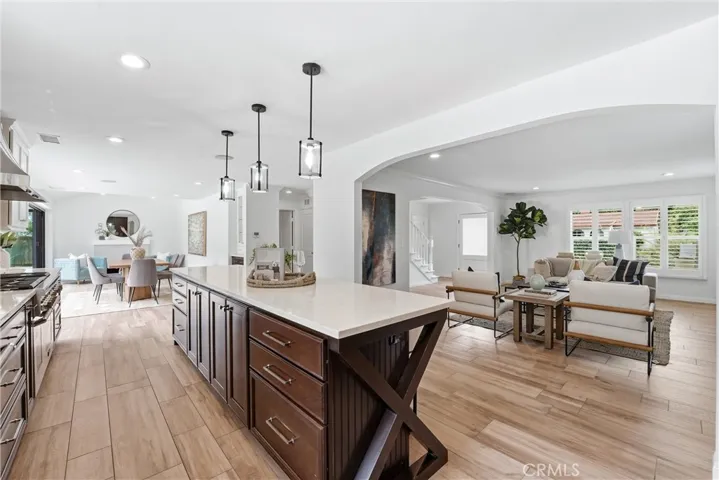 Large Center Island, dual Tone Cabinets, Pendant Lights, Inside Cabinet Lighting