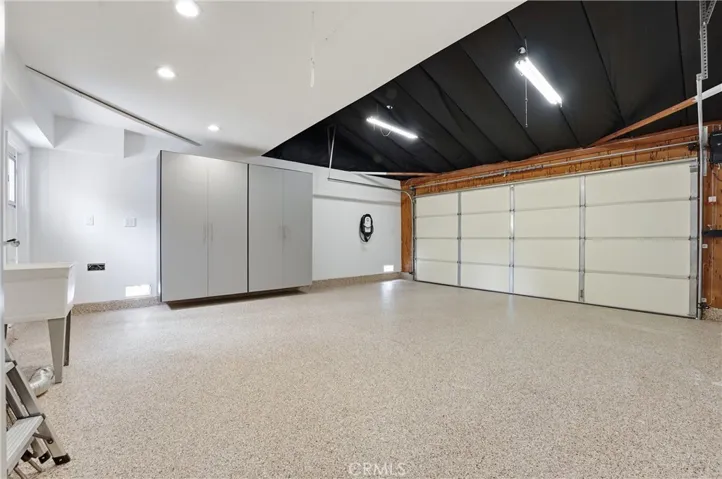 Immaculate Garage with EV Charger, Storage, New Flooring