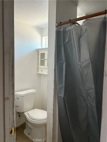 Part of the bath, shower in the right side