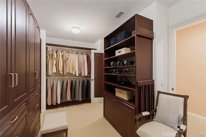 Master Bedroom Walk-In Close - Virtually Staged