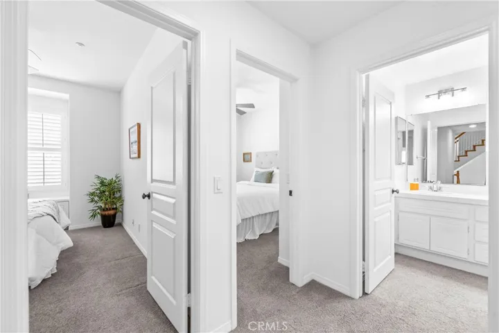 Hall transition to bedrooms two and three.