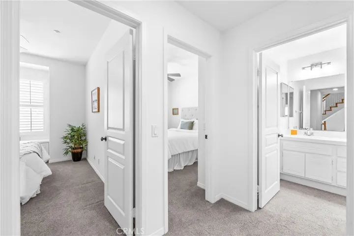 Hall transition to bedrooms two and three.