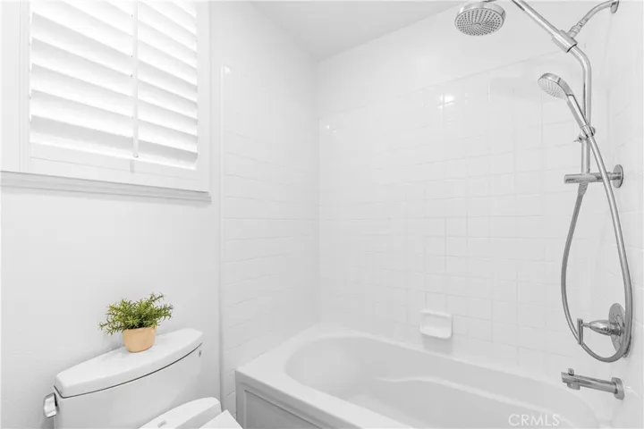 Bright and beautifully maintained upstairs full bathroom.
