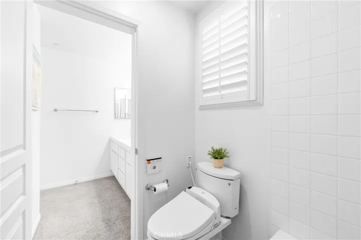 Bright and beautifully maintained upstairs full bathroom.