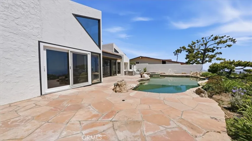 backyard with pool and hot tub