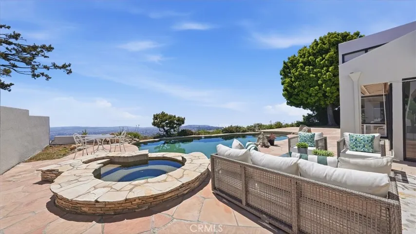 backyard with pool and hot tub