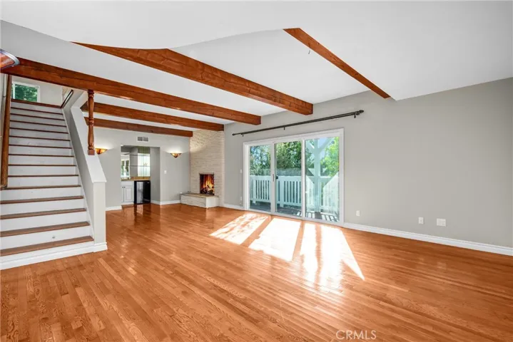 family room with slider to lower deck and 12 pp spa