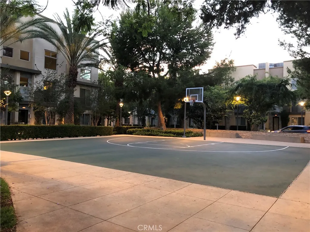 Community basketball court offering fun outdoor recreation just steps from your home.