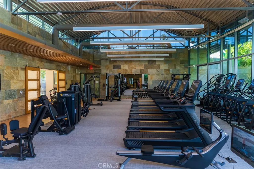 Modern resident gym with premium equipment for a complete at home fitness experience.