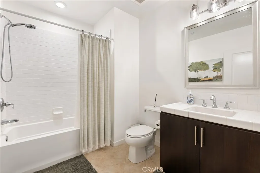 Spa inspired bathroom featuring dual sinks, modern finishes, and generous counter space.