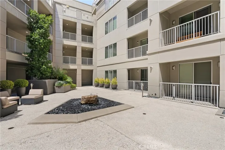 Resort style courtyard offering a peaceful and beautifully maintained community setting.