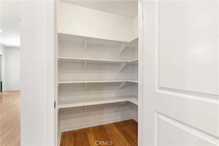 Walk in pantry offering exceptional kitchen storage and everyday convenience.