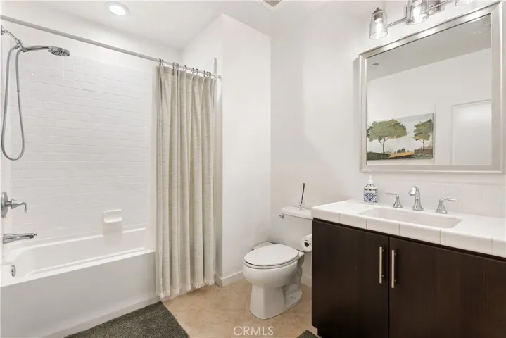 Spa inspired bathroom featuring dual sinks, modern finishes, and generous counter space.