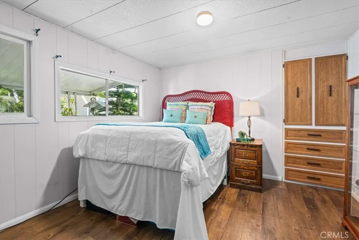 Bedroom 1 with attached cabinets