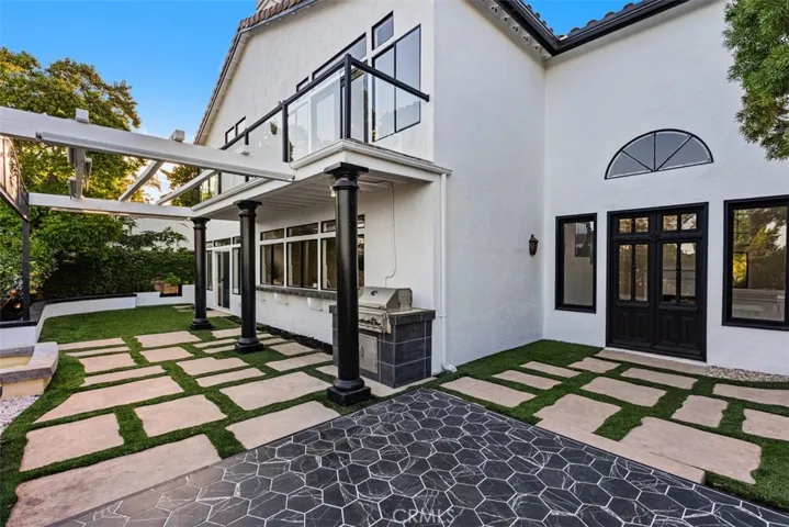 Low maintenance , high-end backyard made for entertainment