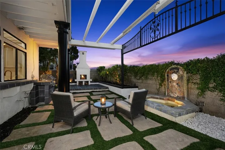 Virtually staged: Low maintenance , high-end backyard