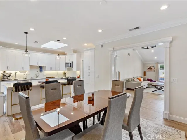 Dining room into kitchen  and living room