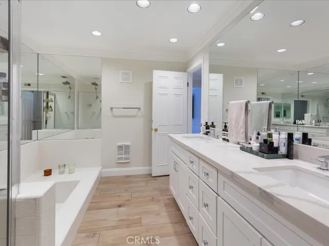 Primary bathroom counter and cabinets