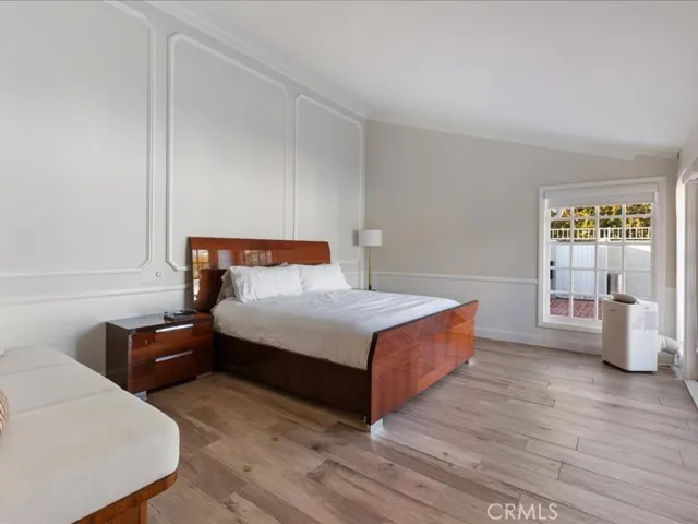 Primary bedroom with high ceiling