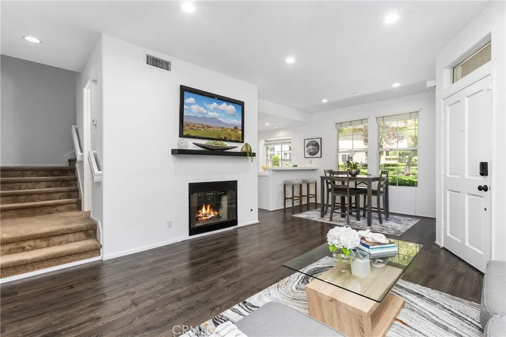 Digitally Altered (Fire & TV picture) Open Family Room w/Fireplace