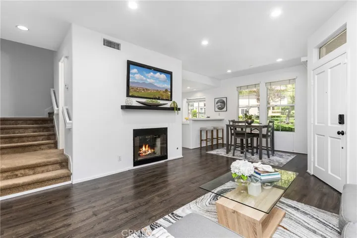 Digitally Altered (Fire & TV picture) Open Family Room w/Fireplace