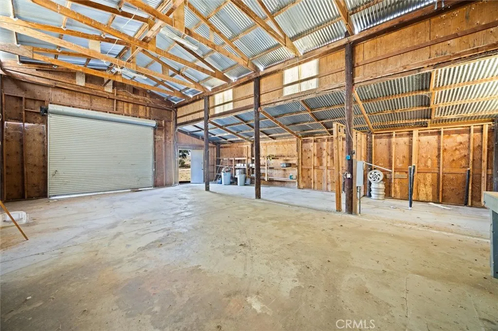 Versatile space in the barn with tall roll up door