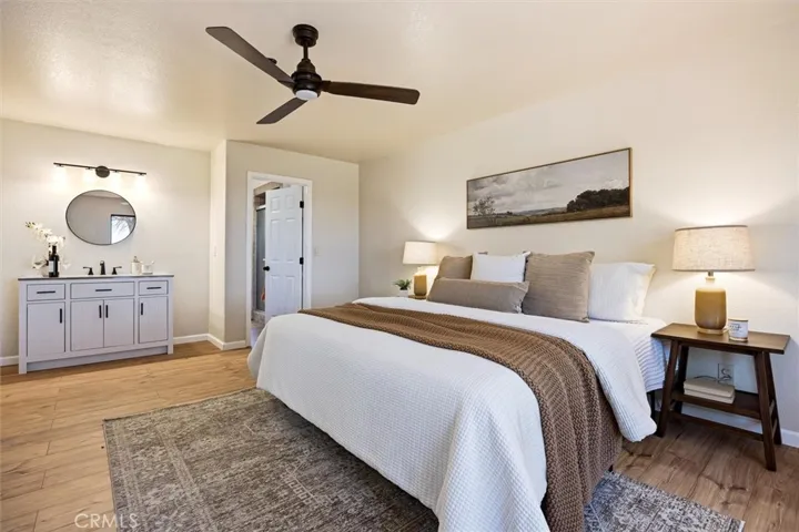Spacious primary bedroom with access to bathroom