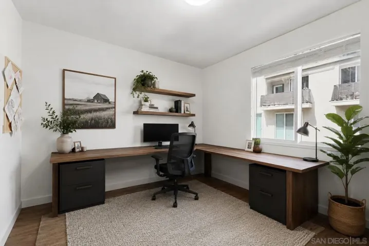 Gym virtually staged as an office. https://zimg.paragon.ice.com/ParagonImages/Property/PA/SDMLS/-524919/29/533/400/c3a5042187bb9c77d1cf3a64213d52e8/3/3686c05f7822e1c3541be5865be3a375/-524919-b7d1ca16-a76d-4e26-bc5d-e9bd0659ea6b.JPG