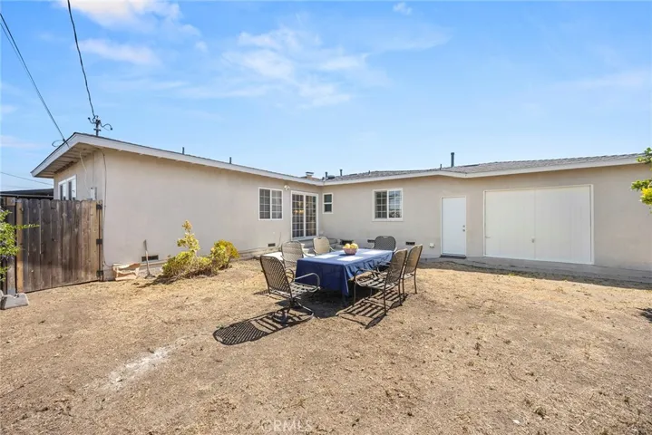 Good-size backyard to personalize as you wish! Note - pull-through garage door on the right.