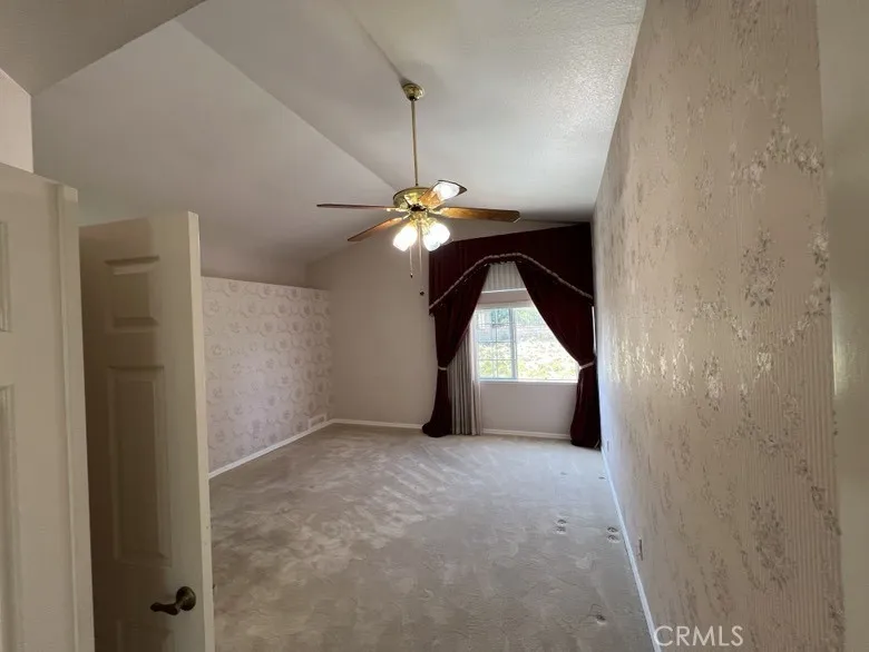Primary Bedroom with Vaulted