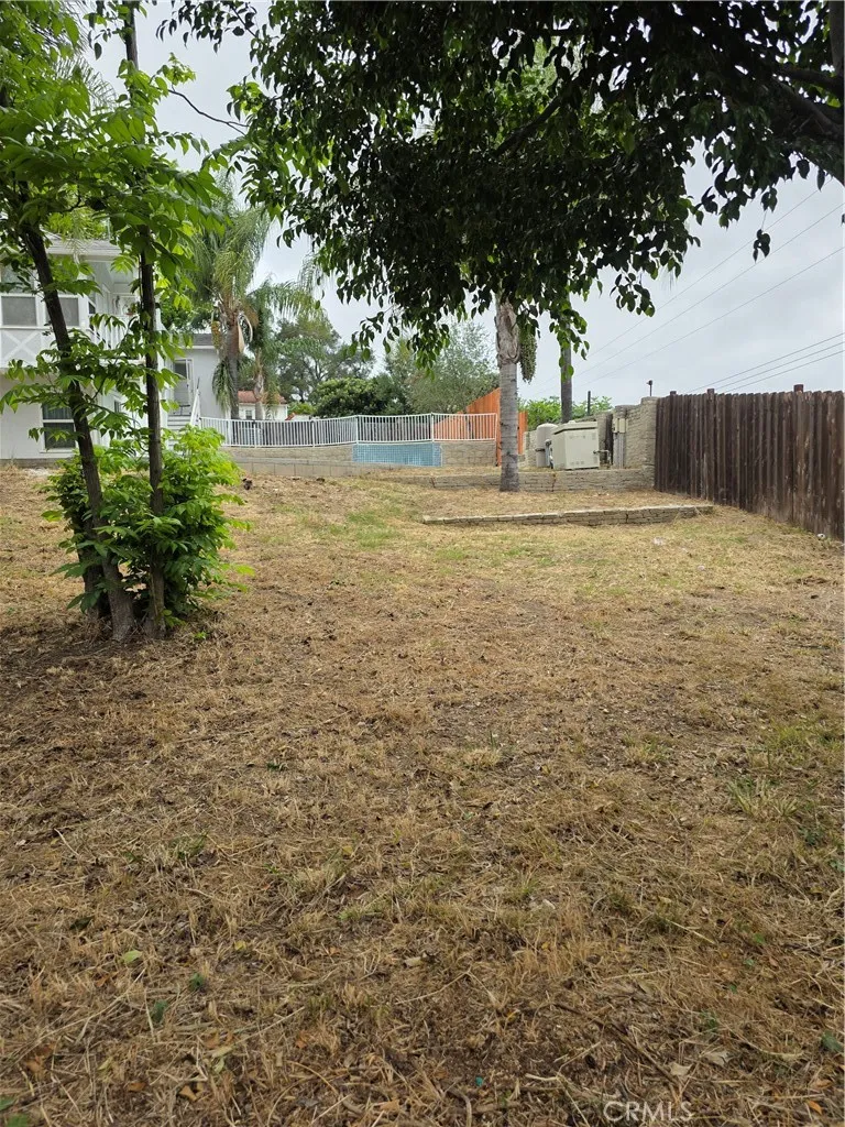 REAR OF DOUBLE LOT TOWARD POOL AND HOUSE