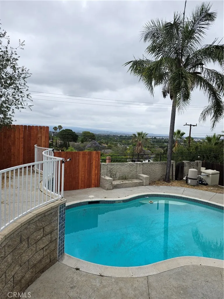 VIEW FROM BALCONY OUTSIDE OF THE SUNROOM (OFFICE OR BEDROOM?)