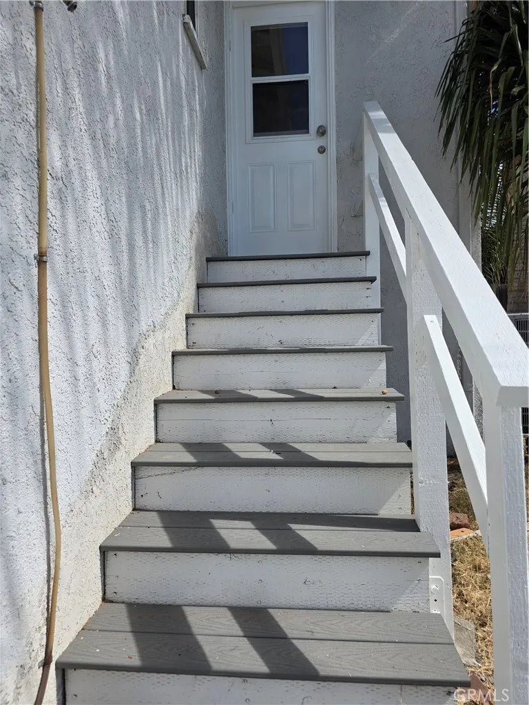 Rear access steps to/from pool side