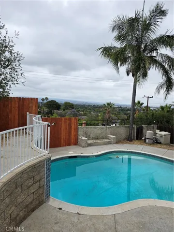 VIEW FROM BALCONY OUTSIDE OF THE SUNROOM (OFFICE OR BEDROOM?)