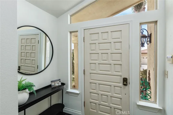Front marble tiled entry.