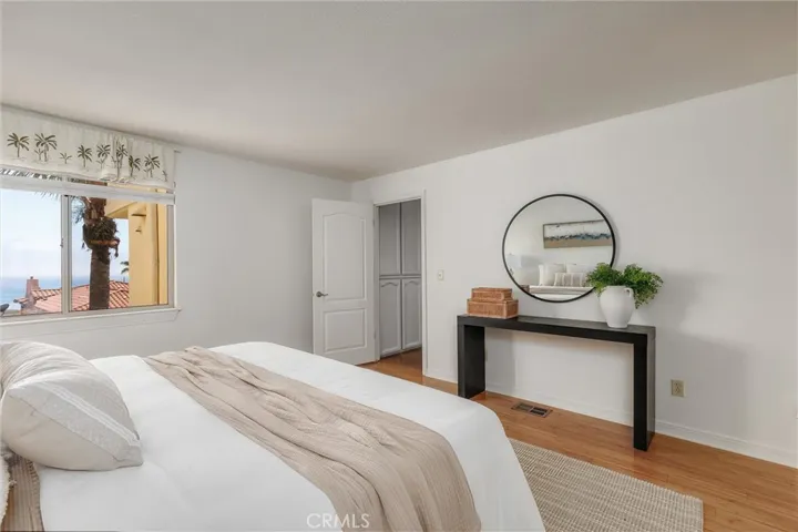 Primary bedroom with ocean view from bed.