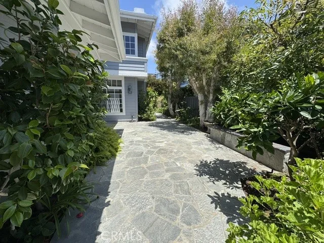 Entry with mature landscaping
