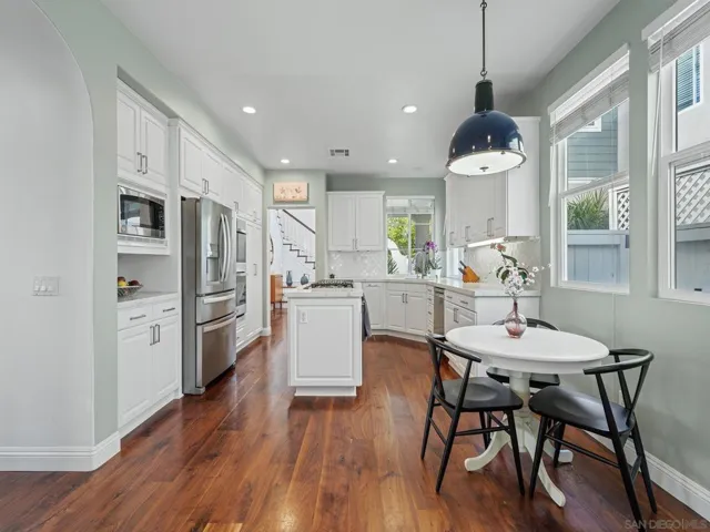 Easy access from kitchen to family room creating a spacious great room along with the informal breakfast nook easting area