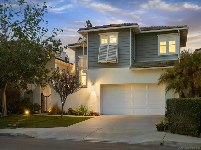 This inviting home looks good the second you pull up to it. Great artificial turf is always green!