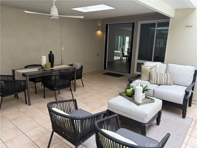 Spacious entertaining patio with cooling ceiling fan